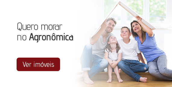 Casal com seus filhos em um novo lar, o texto à esquerda diz "Quero morar no Agronômica ver imóveis"